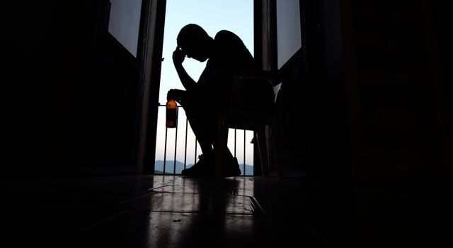 man suffering alcohol withdrawals